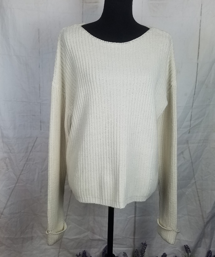 A n.a cream pull over sweater